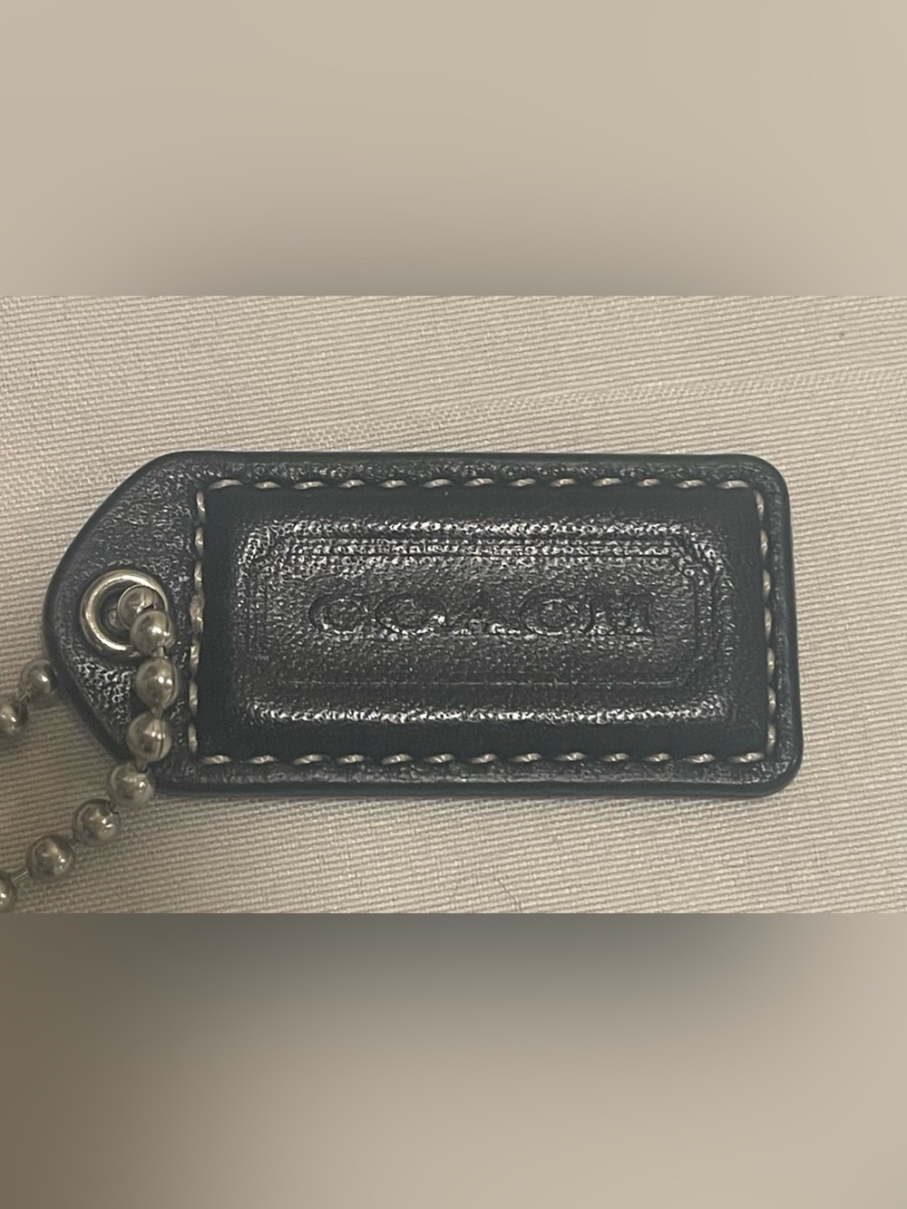 Coach small brown Leather hang tag with Contrast Stitching
